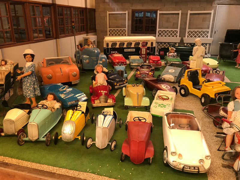 Great collection of pedal cars.